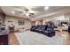 Entertainment basement featuring a row of comfortable seating, carpet and wooden floors at 5350 Chico Grey Dr, Indianapolis, IN 46237