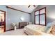 Well-lit bedroom with a large window, vaulted ceiling, dresser, and an inviting atmosphere at 5350 Chico Grey Dr, Indianapolis, IN 46237