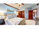 Stylish bedroom featuring a vaulted ceiling, ample closet space, and calming blue tones at 5350 Chico Grey Dr, Indianapolis, IN 46237