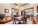 Elegant dining room with a coffered ceiling, stylish chandelier, and wood trim, perfect for Gathering gatherings at 5350 Chico Grey Dr, Indianapolis, IN 46237