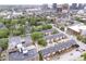 Stunning aerial view of townhouses nestled in a vibrant downtown area, offering both urban convenience and neighborhood charm at 536 Lockerbie S Cir, Indianapolis, IN 46202