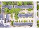 Bird's-eye view captures the organized layout of the townhouses, beautifully integrated with greenery and neighborhood streets at 536 Lockerbie S Cir, Indianapolis, IN 46202