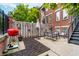 Cozy backyard patio with stylish outdoor furniture and a barbecue grill at 536 Lockerbie S Cir, Indianapolis, IN 46202