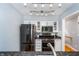 Contemporary kitchen boasts modern appliances, white cabinetry, and ample lighting at 536 Lockerbie S Cir, Indianapolis, IN 46202