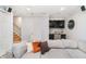 Comfortable living room features a large sectional sofa and a wet bar in the background at 536 Lockerbie S Cir, Indianapolis, IN 46202