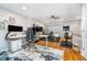 This well-lit home office has multiple desks and includes space for workout equipment at 536 Lockerbie S Cir, Indianapolis, IN 46202