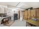 Finished basement with ample storage cabinets, a desk, and a table at 577 Century Oaks Dr, Zionsville, IN 46077
