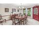 Elegant dining room featuring a chandelier and large windows with backyard views at 577 Century Oaks Dr, Zionsville, IN 46077