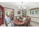 Charming dining room with classic details and views into other living spaces at 577 Century Oaks Dr, Zionsville, IN 46077