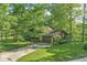 Beautiful wooded lot with a two story house and attached garage in a suburban neighborhood at 577 Century Oaks Dr, Zionsville, IN 46077