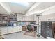 Spacious office area with built-in shelves and cabinets, perfect for working from home at 577 Century Oaks Dr, Zionsville, IN 46077
