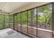 Charming outdoor deck surrounded by lush greenery, perfect for enjoying the natural setting at 577 Century Oaks Dr, Zionsville, IN 46077