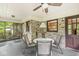 Covered patio area with brick accents, offers a cozy space for outdoor relaxation and dining at 577 Century Oaks Dr, Zionsville, IN 46077