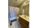 Bathroom featuring a vanity, toilet and tub with a unicorn themed shower curtain at 5920 Copeland Mills Dr, Indianapolis, IN 46221