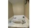 Close up of a white bathtub with tile surround at 5920 Copeland Mills Dr, Indianapolis, IN 46221