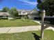 Charming two-story home features a well-manicured lawn and inviting curb appeal with an attached two car garage at 5920 Copeland Mills Dr, Indianapolis, IN 46221