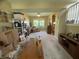 A staged living room featuring neutral walls, carpeted floors, and an open floor plan layout at 5920 Copeland Mills Dr, Indianapolis, IN 46221