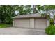 Detached two-car garage with ample parking space and neutral color scheme at 595 W Poplar St, Zionsville, IN 46077