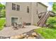 Backyard patio with outdoor dining set, overlooking the lawn and garden at 6168 Pine Bluff Dr, Avon, IN 46123