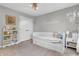 Well-lit bedroom with a ceiling fan and crisp, neutral decor at 6168 Pine Bluff Dr, Avon, IN 46123