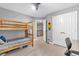 Bedroom featuring a wooden bunk bed, carpeted flooring, and closet with white doors at 6168 Pine Bluff Dr, Avon, IN 46123