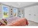 Bright and airy bedroom offers lots of natural light from the large windows at 6168 Pine Bluff Dr, Avon, IN 46123