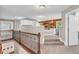 Bonus room with carpet, an accent wall, and a set of built-in cabinets at 6168 Pine Bluff Dr, Avon, IN 46123