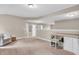 Spacious carpeted bonus room features a built-in desk and offers lots of natural light at 6168 Pine Bluff Dr, Avon, IN 46123
