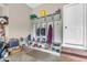 Functional mudroom with built-in storage cubbies and coat hooks near the entrance at 6168 Pine Bluff Dr, Avon, IN 46123