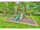 Backyard playground featuring a slide, swing set, and climbing wall provides outdoor fun and recreation at 6168 Pine Bluff Dr, Avon, IN 46123