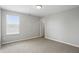 Bedroom with a window and neutral-colored carpeting at 6552 Hunters S Rdg, Zionsville, IN 46077