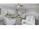 Upstairs living room featuring neutral decor, comfortable seating, and ample natural light at 6552 Hunters S Rdg, Zionsville, IN 46077