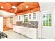 Bright eat-in kitchen featuring ample cabinet space and a door to the yard at 7050 N County Road 650 E, Brownsburg, IN 46112