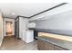 Well-lit laundry room featuring gray accent wall and modern washer and dryer at 7050 N County Road 650 E, Brownsburg, IN 46112
