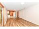 Spacious living room featuring new wood floors leading into the modern kitchen at 7050 N County Road 650 E, Brownsburg, IN 46112