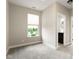 Cozy bedroom with a serene view from the window and an ensuite bathroom at 7152 Cherry Creek Blvd, Carmel, IN 46033