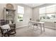 Bright office space with natural light, neutral tones, desk, and bookcase for a comfortable workspace at 7152 Cherry Creek Blvd, Carmel, IN 46033