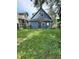 Exterior shot showing backyard with shed and full grass lawn at 764 Haugh St, Indianapolis, IN 46222