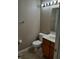 Bathroom featuring a toilet, sink, mirror, and neutral color scheme at 764 Haugh St, Indianapolis, IN 46222