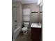 Bathroom featuring full tub shower combo, toilet and sink at 764 Haugh St, Indianapolis, IN 46222