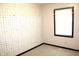 Bedroom with alphabet wallpaper, carpeting, and window with blinds at 7931 Guion Rd, Indianapolis, IN 46268