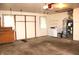 Spacious garage featuring a washer, dryer, utility sink, and laundry area at 7931 Guion Rd, Indianapolis, IN 46268