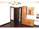 Main bedroom with hardwood floors and en-suite bathroom featuring a vanity at 7931 Guion Rd, Indianapolis, IN 46268