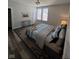 Serene bedroom featuring a queen bed with soft linens, complemented by stylish decor and natural light at 811 E Minnesota St, Indianapolis, IN 46203