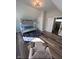 Cozy bedroom with a bunk bed, a soft rug, and a comfortable chair, perfect for relaxation at 811 E Minnesota St, Indianapolis, IN 46203