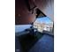 Cozy covered patio provides a relaxing view of the neighborhood landscape at 811 E Minnesota St, Indianapolis, IN 46203