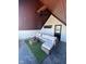 Stylish covered patio featuring comfortable lounge seating, perfect for entertaining at 811 E Minnesota St, Indianapolis, IN 46203
