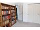 Cozy bedroom with built-in shelving and a closet at 8346 Weathervane Cir, Indianapolis, IN 46239
