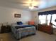 Comfortable main bedroom with natural light, carpeted floors, and ceiling fan at 8346 Weathervane Cir, Indianapolis, IN 46239