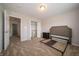 Spacious bedroom with a large closet, carpeted floor, and natural light at 8710 N Aspen Way, McCordsville, IN 46055